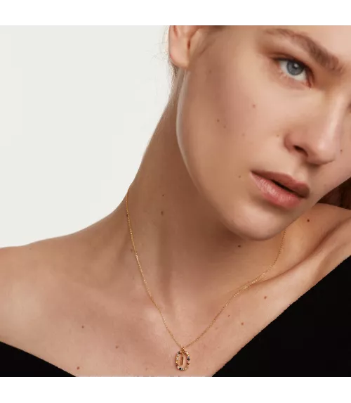Collar P D Paola, letra I, con baño de oro de 18k.