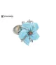 Anillo de plata, flor turquesa.