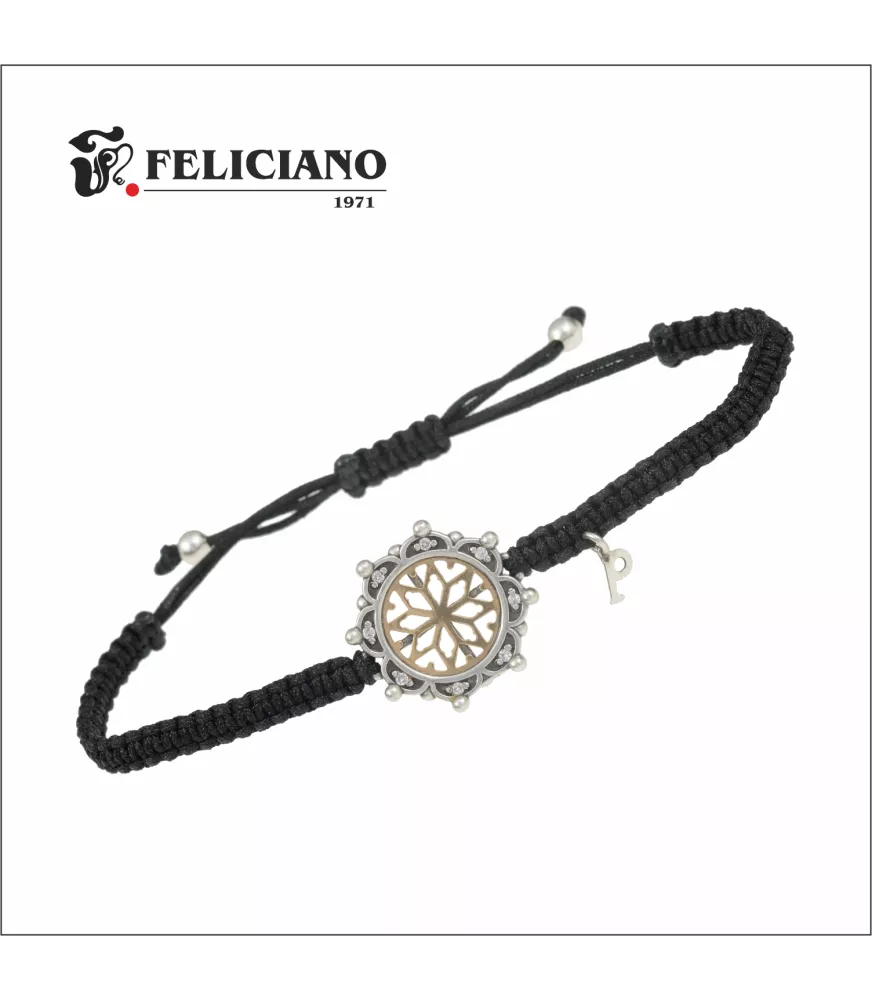 Pulsera rosetón, en plata y oro de 18k, macramé con bisel circonitas y puntos.