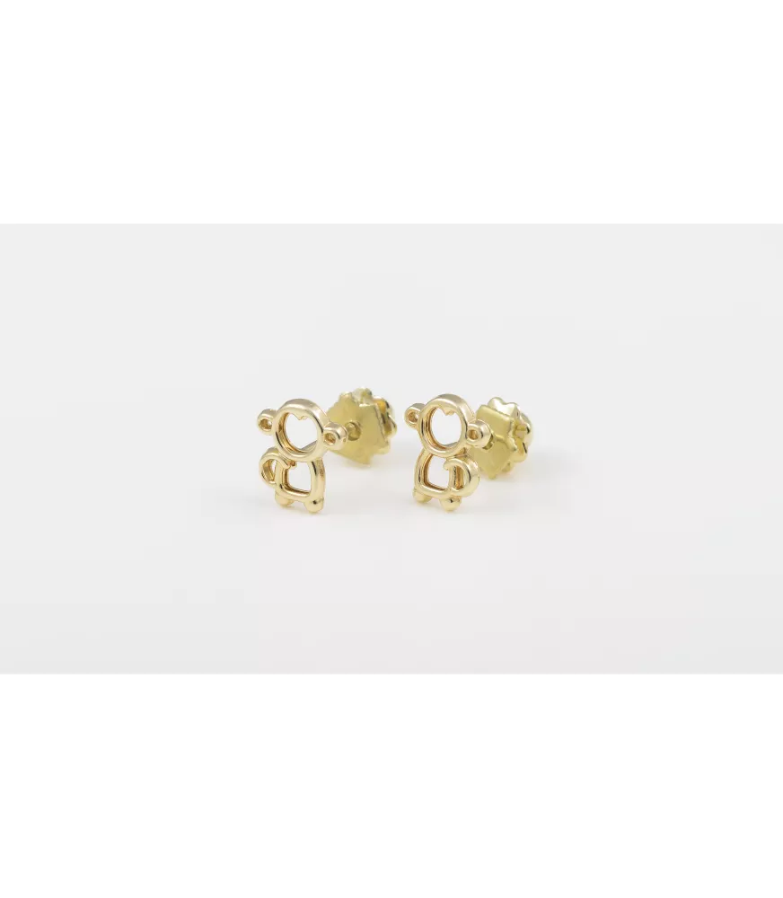 PENDIENTE DE BEBE ORO 18 KTS MONO SILUETA.