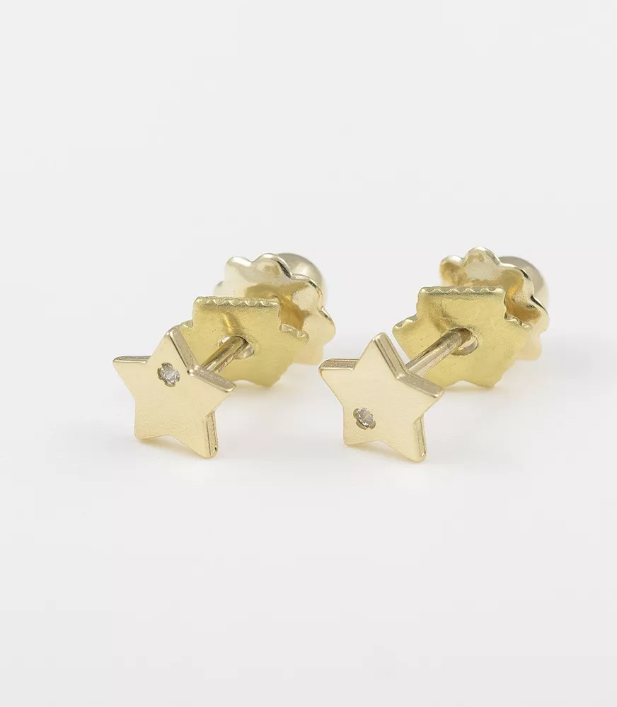 PENDIENTE DE BEBE ORO 18 KTS ESTRELLA CON UNA CIRCONITA.