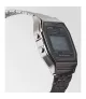 Reloj Casio vintage digital, con esfera negra y brazalete de acero.