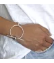 Pulsera Orígenes Slim CXC, en metal bañado en plata.