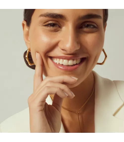 Pendientes CXC Aro Bambú, en metal bañado en oro.