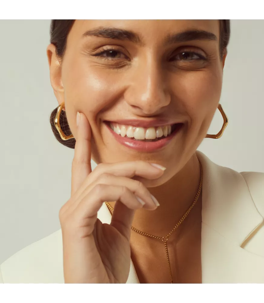 Pendientes CXC Aro Bambú, en metal bañado en oro.