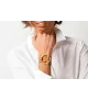 Pulsera Orígenes Cuero CXC, en metal bañado en oro y cuero camel