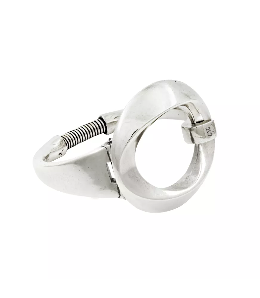 Pulsera Oleaje CXC, en metal bañado en plata .