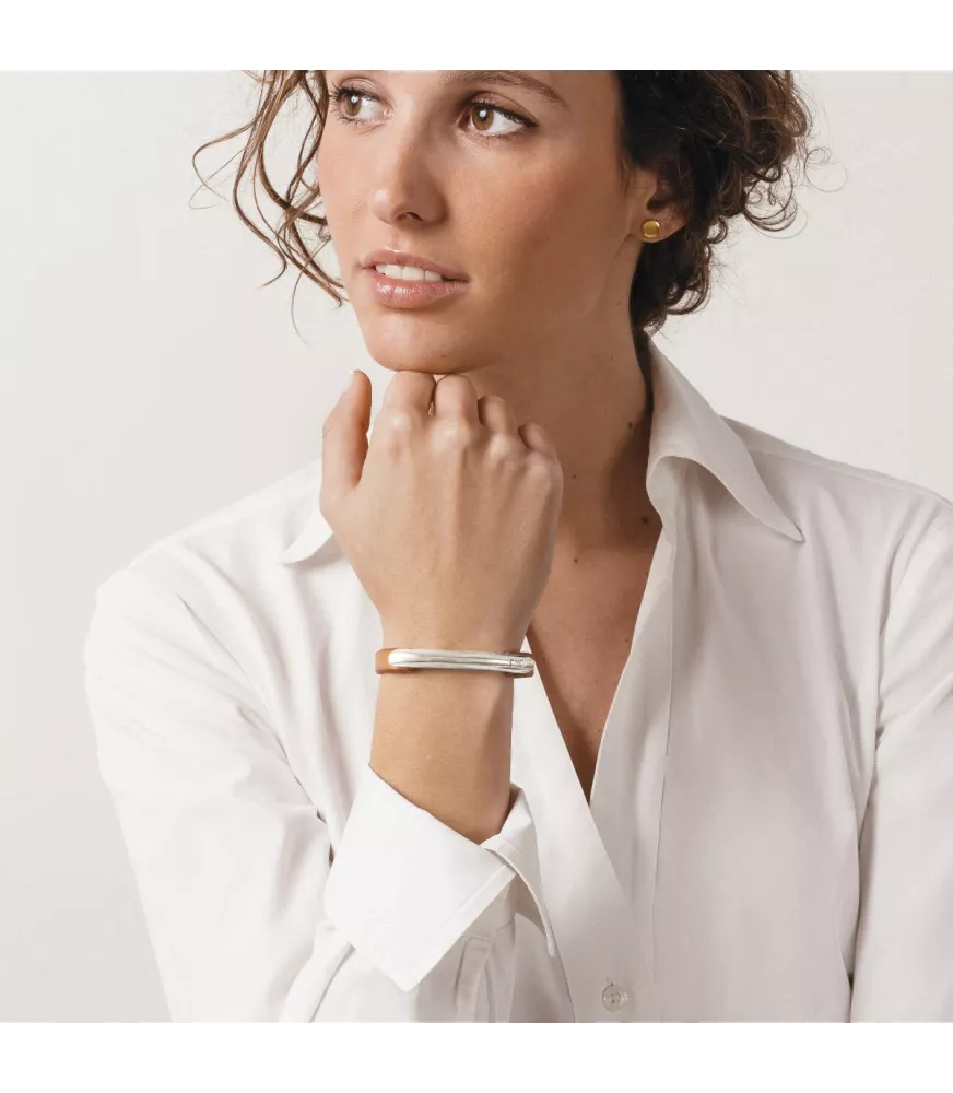 Pulsera Hipódromo cuero CXC, en metal bañado en plata .