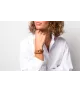 Pulsera Grillete Roll CXC, en metal bañado en oro.