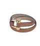 Pulsera Grillete Roll CXC, en metal bañado en oro.
