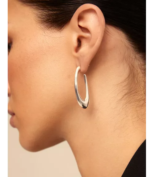 Pendientes Tú Orbitas? UNOde50, en metal bañado en plata.