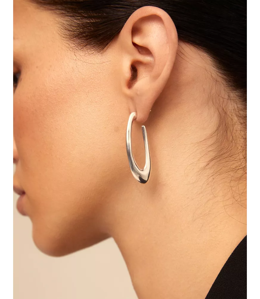 Pendientes Tú Orbitas? UNOde50, en metal bañado en plata.