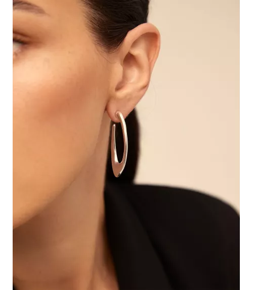 Pendientes Tú Orbitas? UNOde50, en metal bañado en plata.