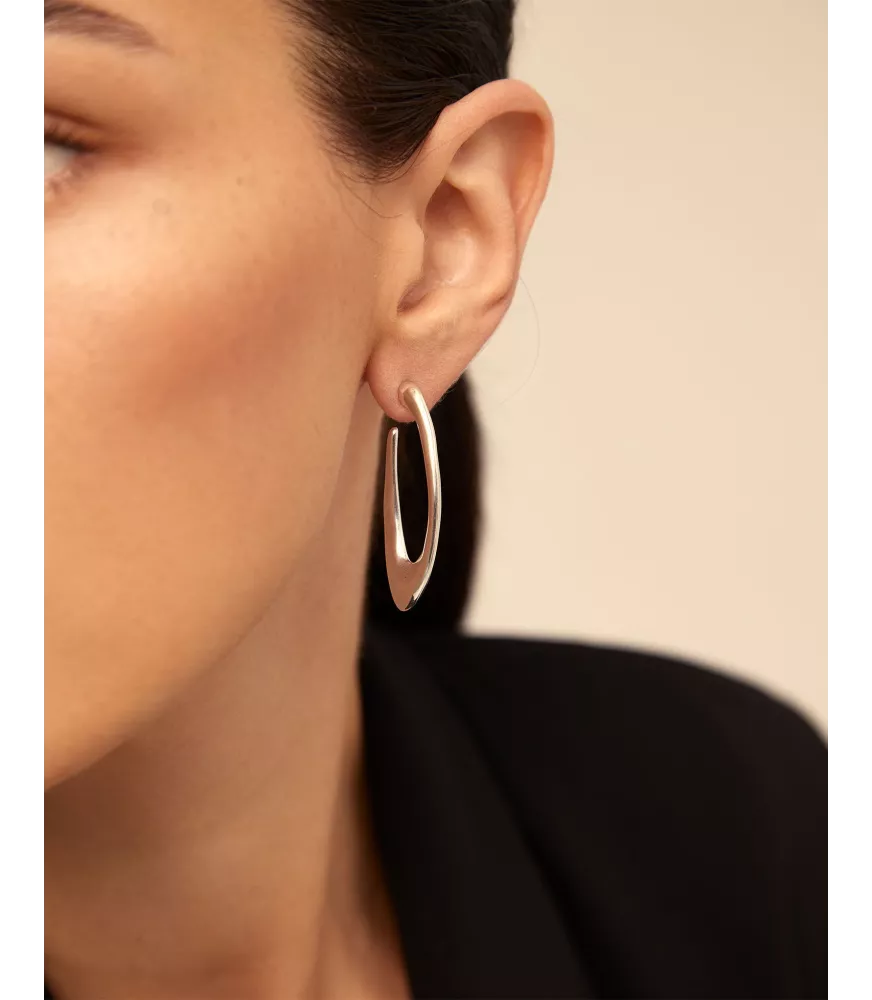 Pendientes Tú Orbitas? UNOde50, en metal bañado en plata.