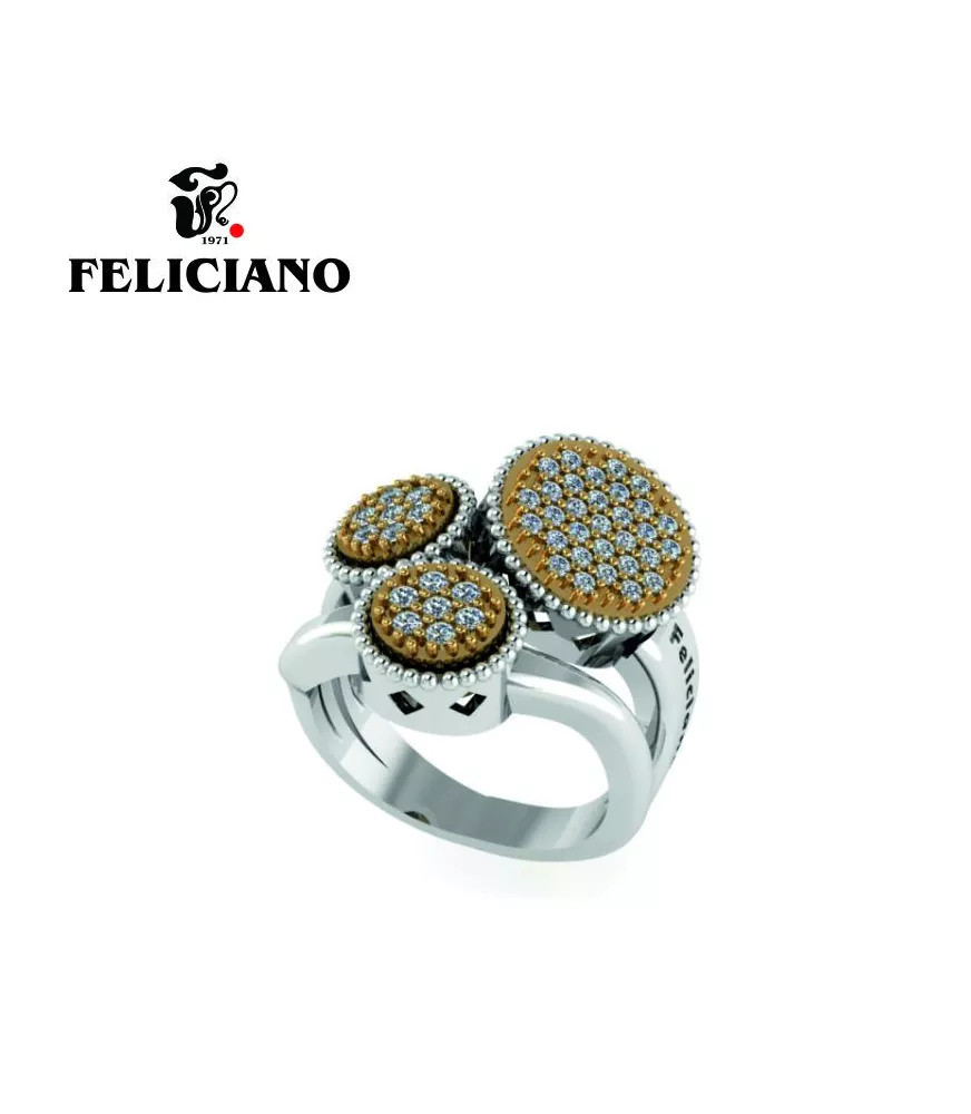 ANILLO TRES PIEZAS. DOS GRANDES Y UNA PEQUEÑA EN PLATA Y BRONCE CON INCRUSTACIONES DE CIRCONITAS