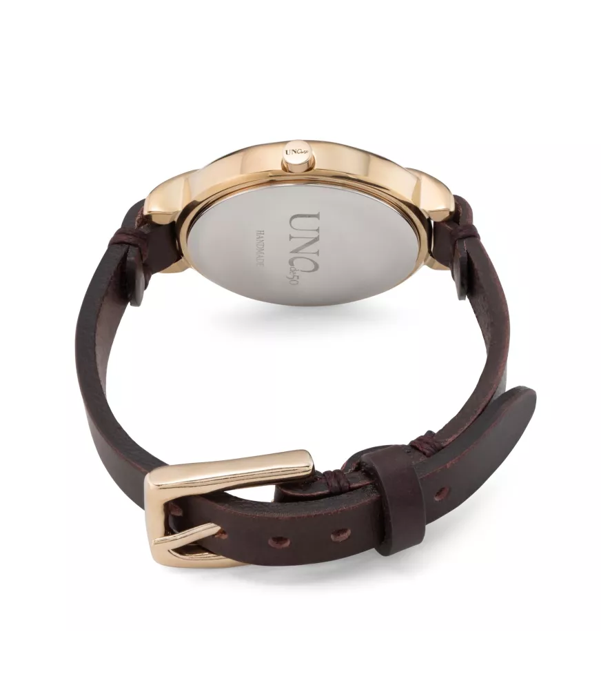 Reloj Unbeatable Unode50, en metal bañado en oro.