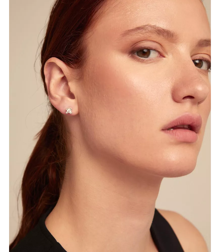 Pendientes Cosmos Unode50, en metal bañado en plata.