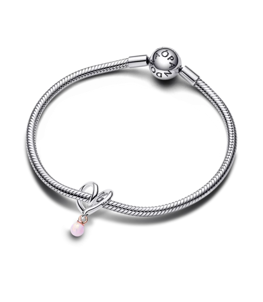 Charm en plata de ley y con un recubrimiento en oro rosa de 14k Corazón Envuelto en Dos Tonos ​