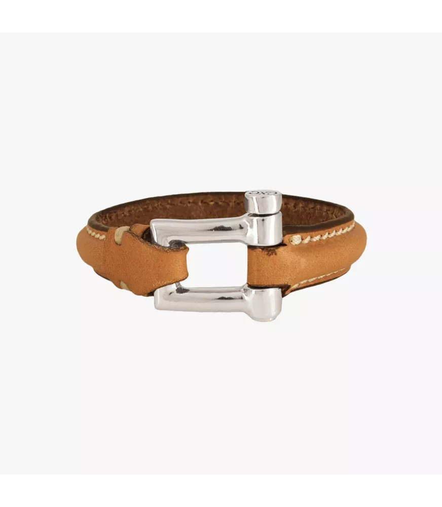 Pulsera Grillete Cuero Duna CXC, en metal bañado en plata.