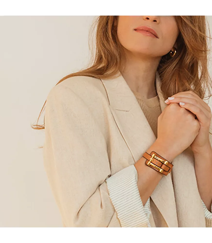 Pulsera Hidalgo Cuero CXC, en metal bañado en oro.