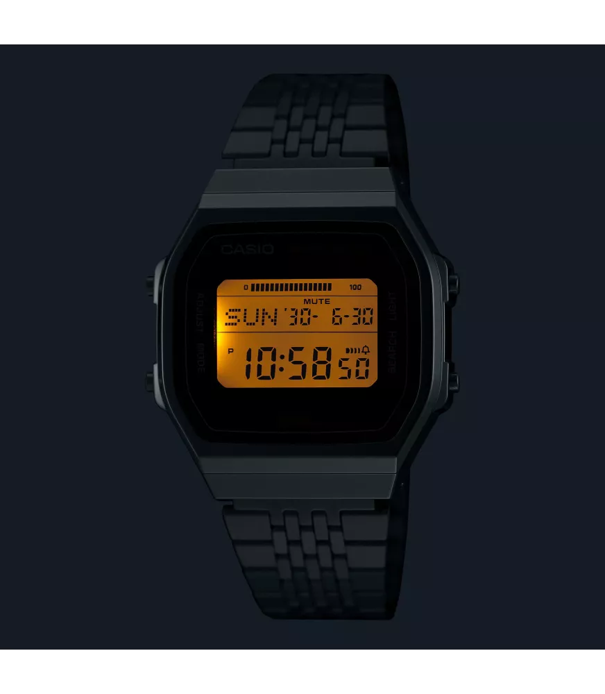 Reloj Casio vintage digital, con esfera negra y brazalete de acero.