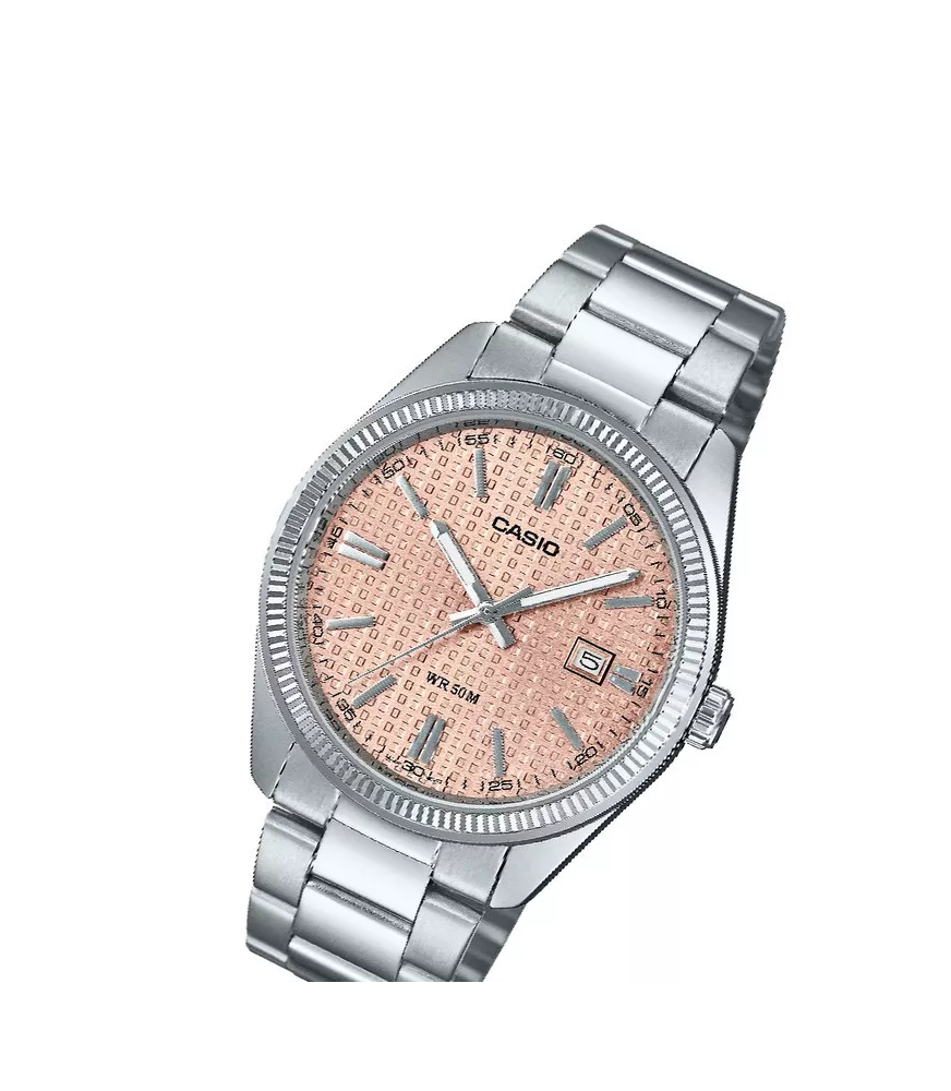 Reloj Casio vintage analógico, con esfera rosa y brazalete de acero.