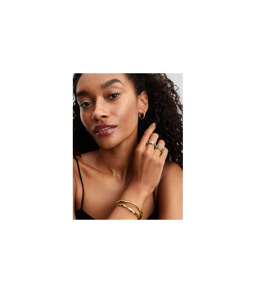 Pulsera Rígida con un recubrimiento en oro de 14k Abierta Entrelazada