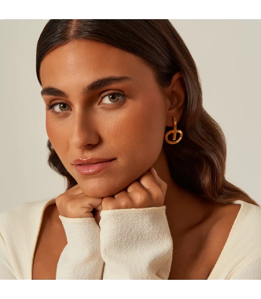 Pendientes CXC Ópera, en metal bañado en oro.