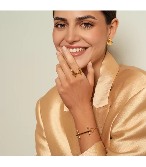 Pulsera Bit St. Moritz Slim CXC, en metal bañado en oro.