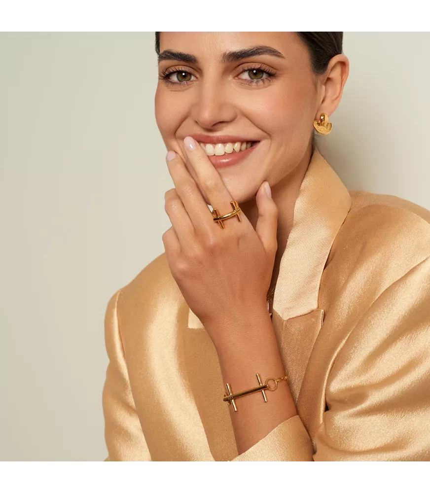 Pulsera Bit St. Moritz Slim CXC, en metal bañado en oro.