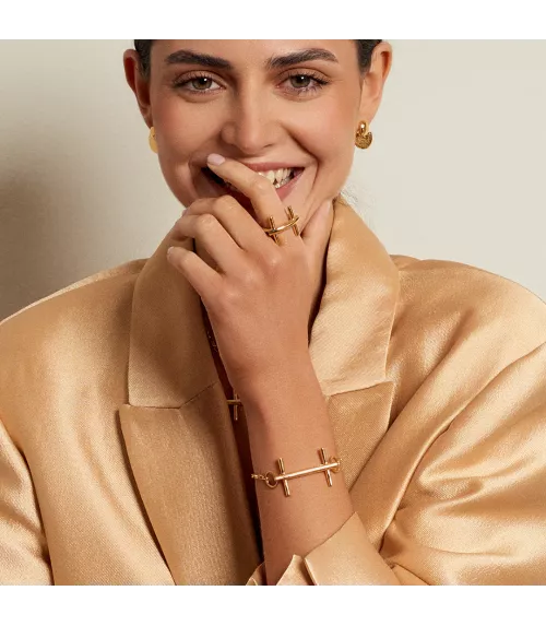 Pulsera Bit St. Moritz Slim CXC, en metal bañado en oro.