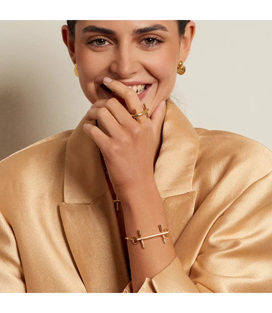 Pulsera Bit St. Moritz Slim CXC, en metal bañado en oro.