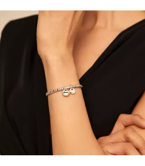 Pulsera Amor Sellado UNOde50, en metal bañado en plata