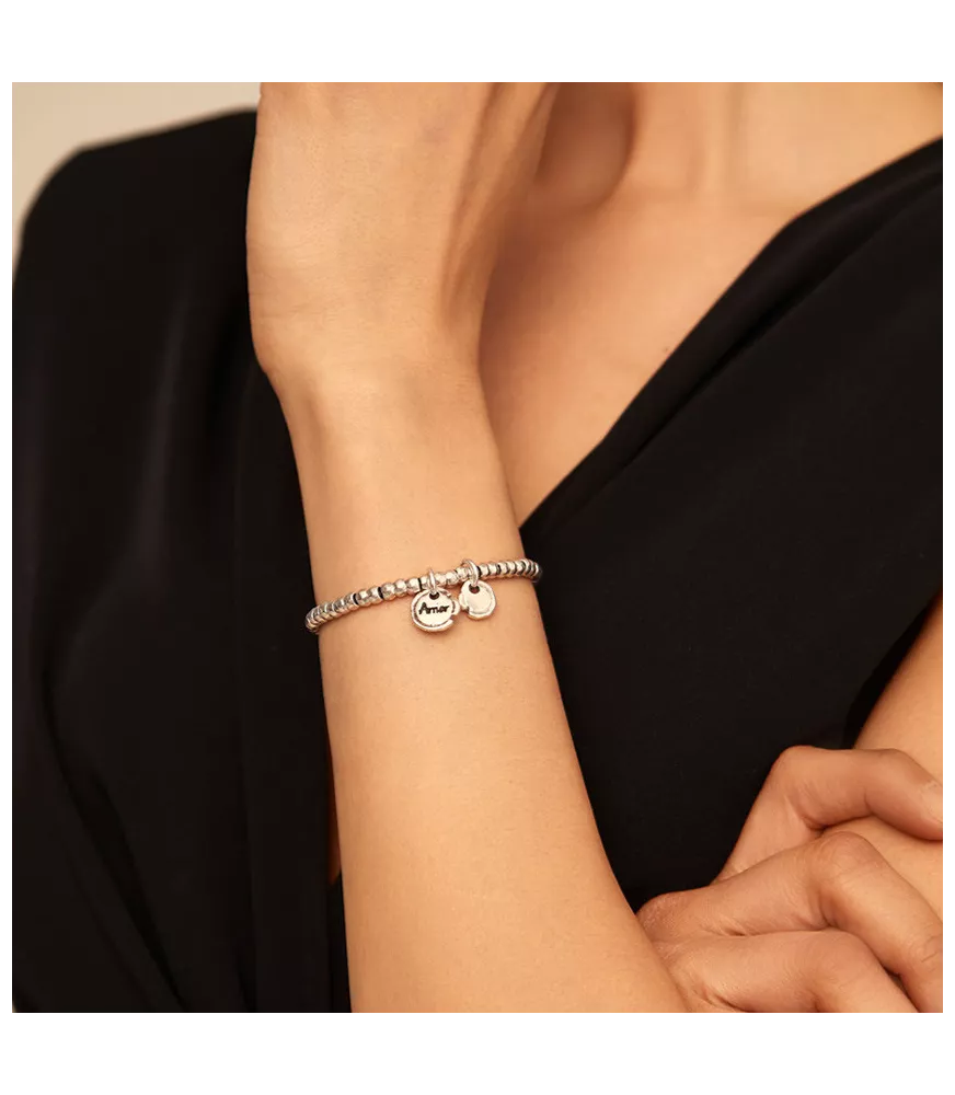 Pulsera Amor Sellado UNOde50, en metal bañado en plata