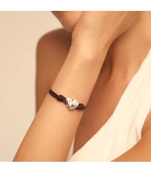 Pulsera Cupido UNOde50, en metal bañado en plata