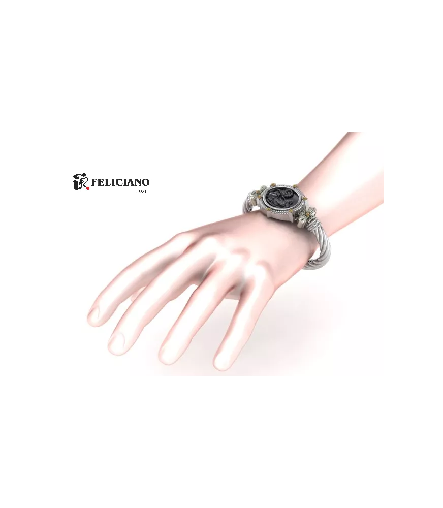 Brazalete en plata de primera ley con moneda de plata oxidada.