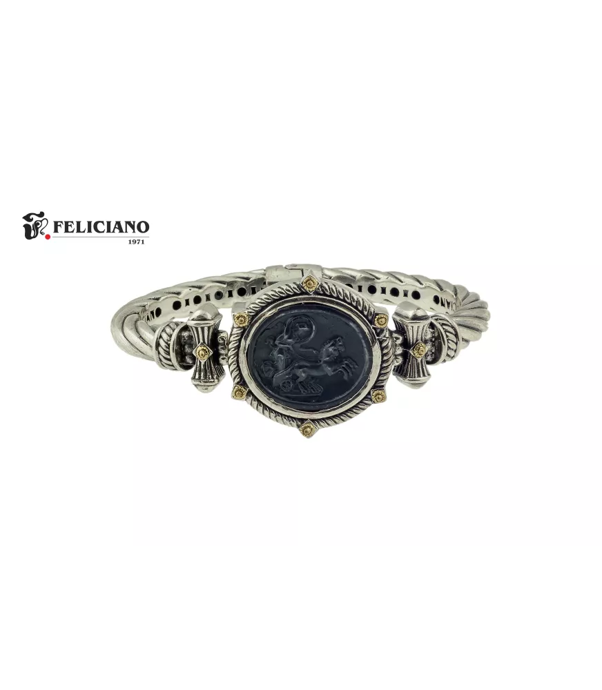 Brazalete en plata de primera ley con moneda de plata oxidada.