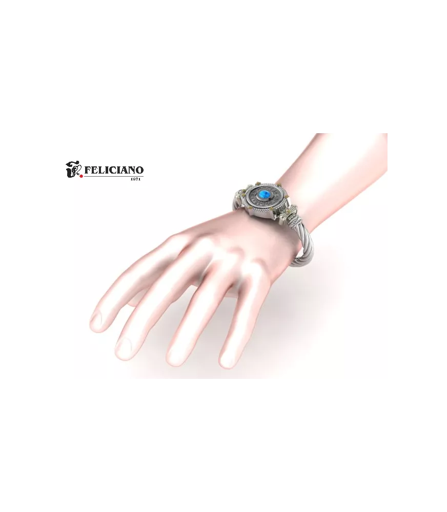 Brazalete en plata de primera ley con cuarzo hidrotermal azul.
