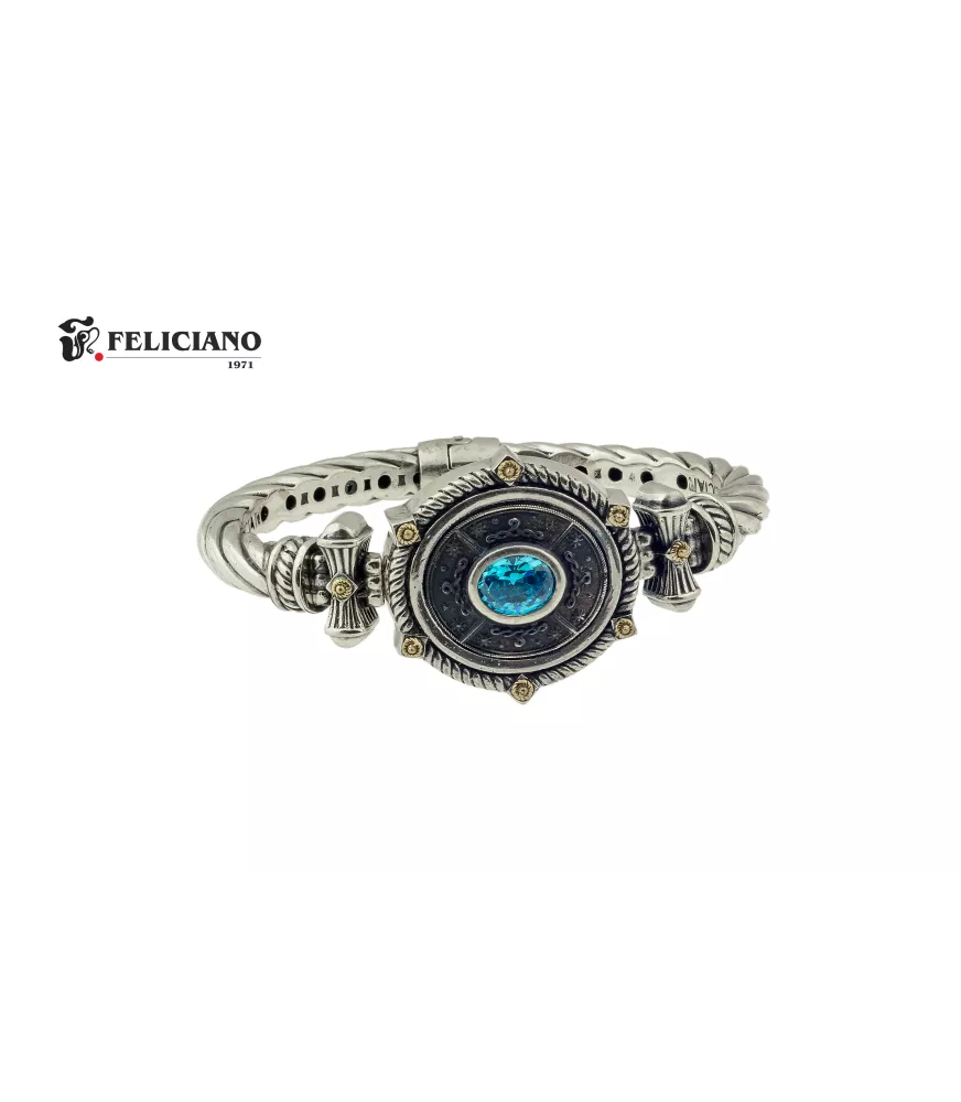 Brazalete en plata de primera ley con cuarzo hidrotermal azul.