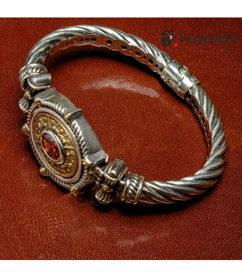 Brazalete en plata de primera ley con cuarzo hidrotermal rojo.