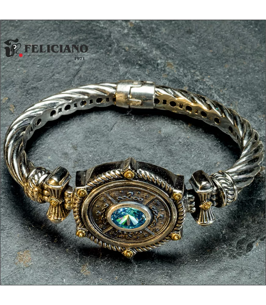 Brazalete en plata de primera ley con cuarzo hidrotermal azul.