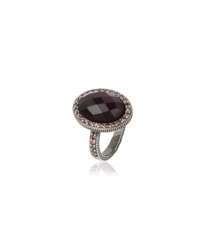 Anillo en plata envejecida con turmalina rosa y circonitas.